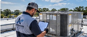 Technician inspecting commercial building equipment